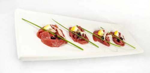 Beef Carpaccio roses with Balsamic pearls